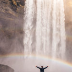 man at waterfall