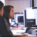 two ladies on a computer