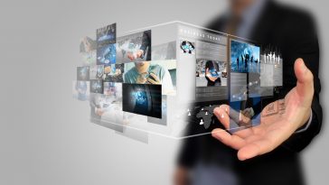 businessman holding social media concept.