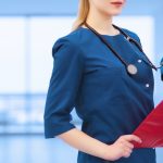 faceless promotional banner. an impersonated couple of medical workers a female nurse or an African American doctor for advertising image covers. medicine advertisement design