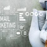 Email marketing with man using a laptop